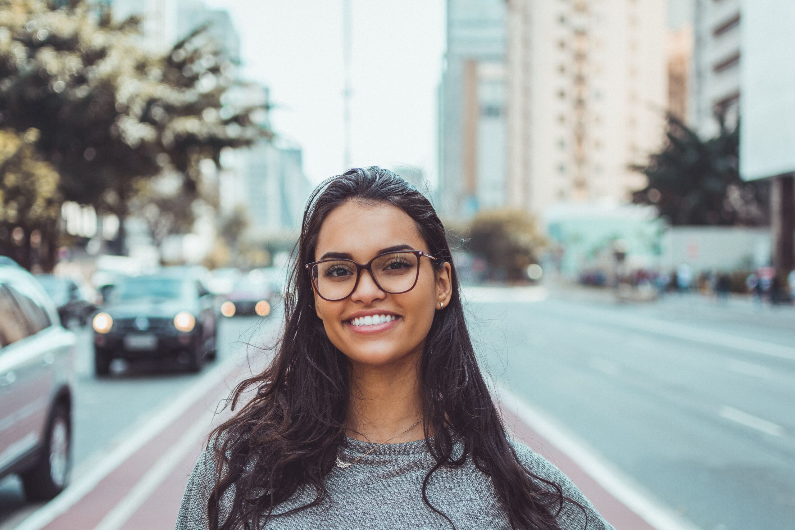 Young woman with bright white teeth and beautiful smile representing fresh breath and oral health