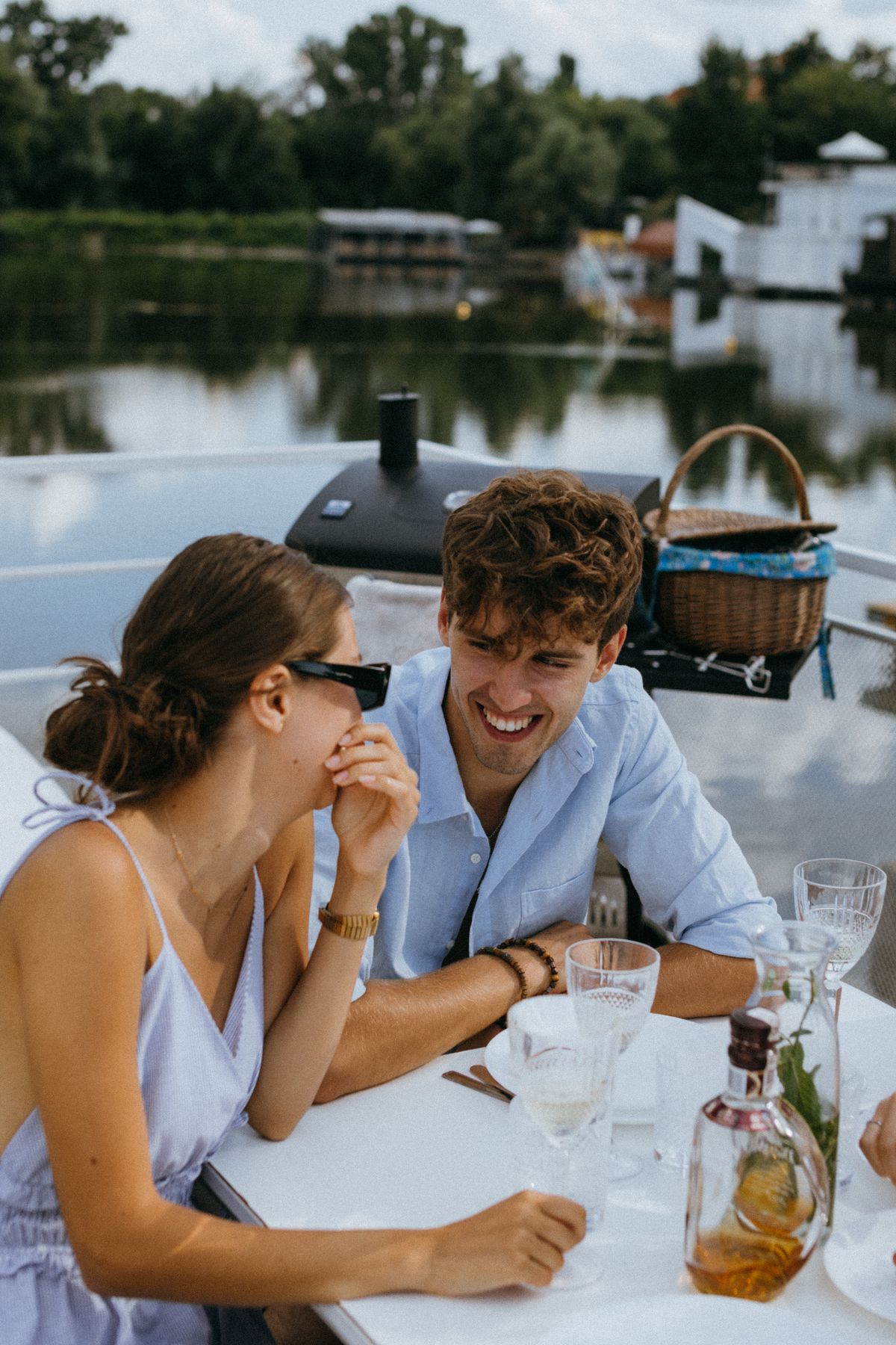 Why Your First Dates Never Turn Into Second Dates (And It's Not You) 1 Couple laughing together on a relaxed date, showing the closeness possible when bad breath is no longer ruining your dating life